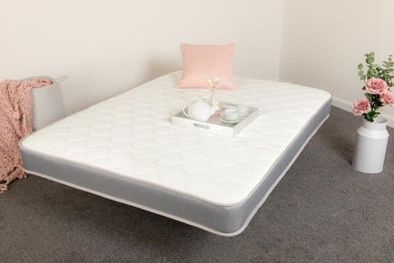 A grey sprung seven core layer memory foam mattress, King