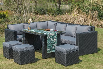 BROWN WITH COVER: A nine-seater L-shaped rattan dining set