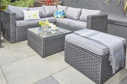BLACK: A six-seater rattan corner sofa patio set