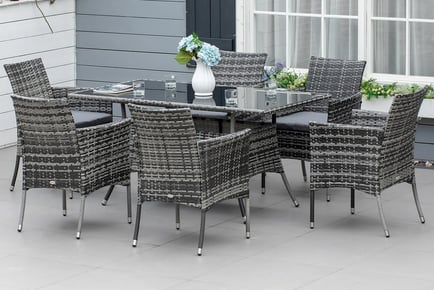 BROWN: A six-seater rattan conservatory dining set