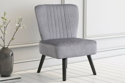 GREY: A velvet shell back chair