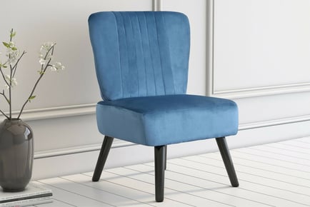 GREY: A velvet shell back chair