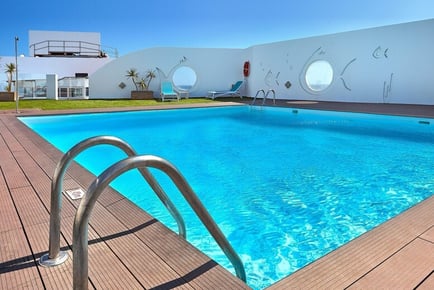 Relaxing Lanzarote Beach Break: Hotel with Pool & Return Flights