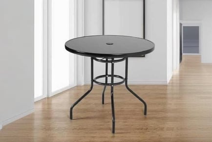 black metal round outdoor dining table with parasol hole