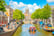 Amsterdam city centre and water canal in De Wallen district, Netherlands