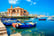 Margherita Theater and fishing boats in old harbor of Bari, Puglia,
