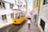 Woman tourist walking in narrow streets of Lisbon city old town.