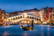 Romantic gondola ride near Rialto Bridge in Venice, Italy