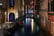 Typical Venetian canal with bridge and Illuminated Christmas tree, night view, Venice, Italy