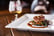 Ribeye Steak Dining with a Bottle of Wine