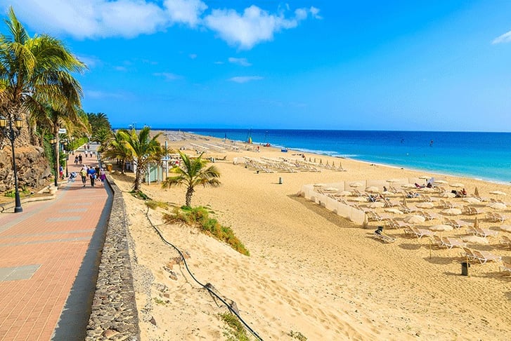 Coastal promenade along sandy beach in Morro Jable town, Fuerteventura - Canary-Islands - Spain