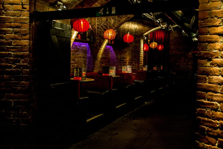 An atmospheric bar with Chinese lantern lights