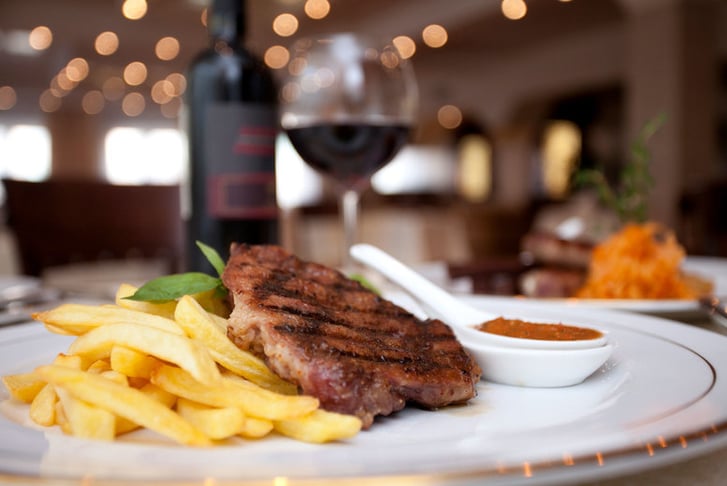 A steak meal for two people with sides and wine at The Crowne Plaza, Glasgow (was £80) OR redeem towards another available deal