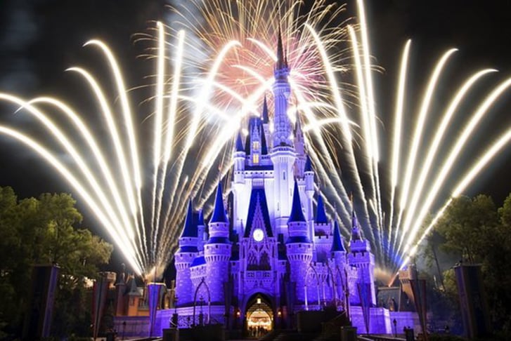 Fireworks going off behind the Magic Castle in Disney World, Florida