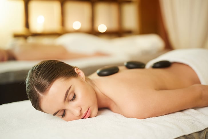 1h Hot Stone Massage with a Glass of Complimentary Bubbly