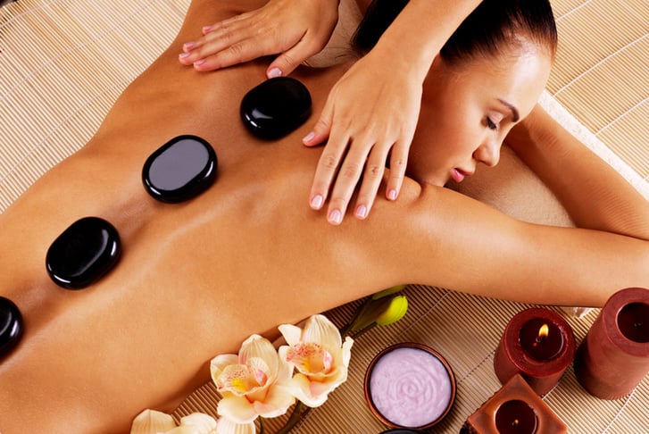 60 Min Pamper Package - Hot Stone Massage, Facial & Glass of Bubbly