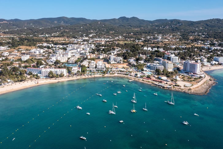 Aerial drone photo of the town of Sant Antoni de Portmany on the west coast of Ibiza Spain’s Balearic Islands