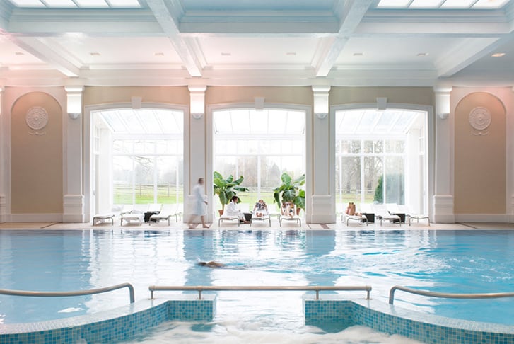 Guests enjoying use of the indoor pool at Champneys Health Spa