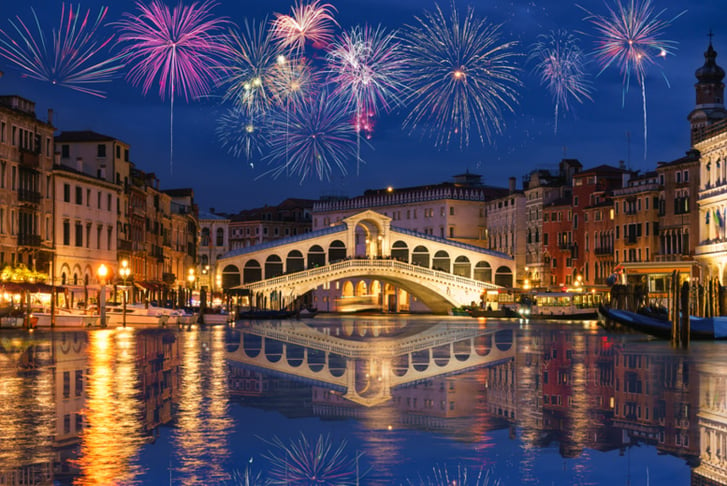 Rialto bridge and Garnd Canal with fireworks in Venice, Italy