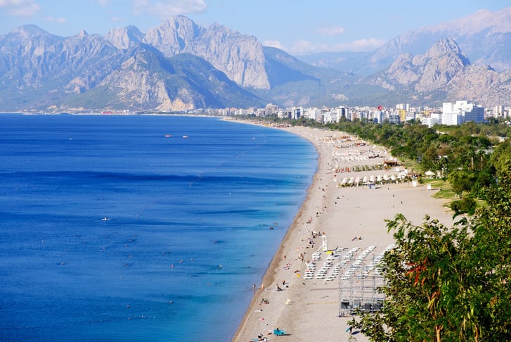 Konyaaltı Beach and Beydağları mountains in Antalya, Turkey