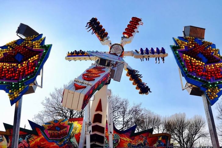 A high, spinning 'Xtreme' ride at a funfair