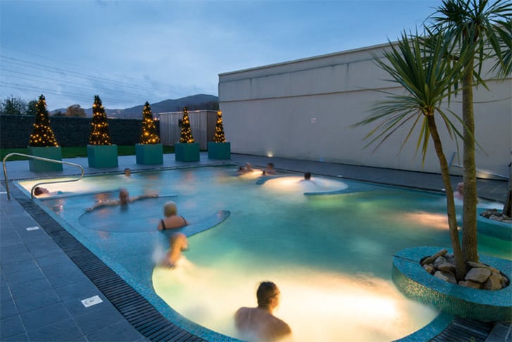 People in a giant Jacuzzi outside The Malvern Spa