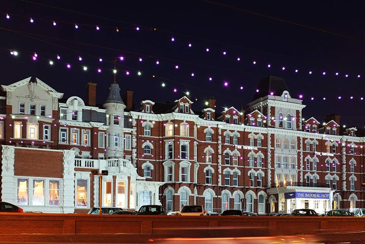 The exterior of The Imperial Hotel at night