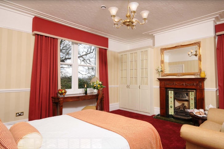 A double guest bedroom at the Brook Meadow Hotel