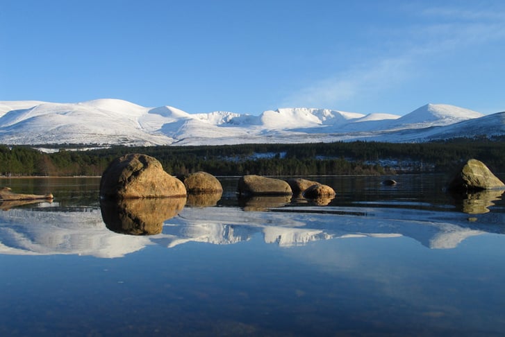 Beautiful lakes and snowy mountains of Loch Morlich