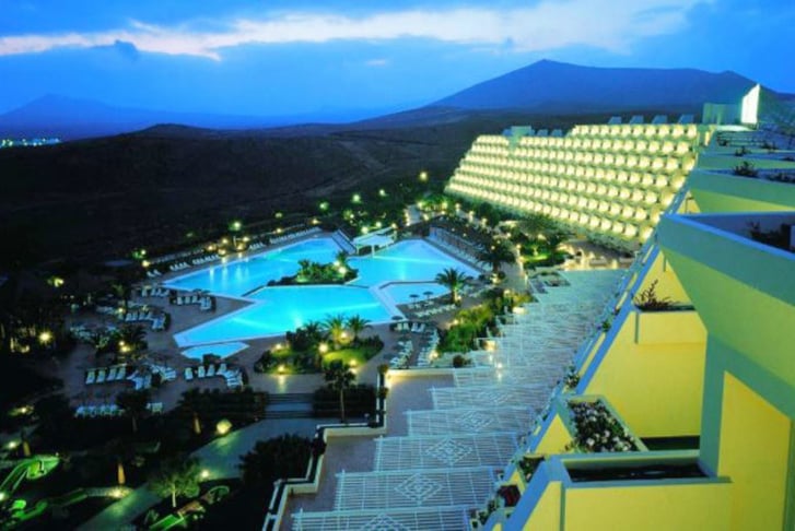 Hotel Beatriz Costa & Spa Lanzarote Spain in the evening over-looking the pool