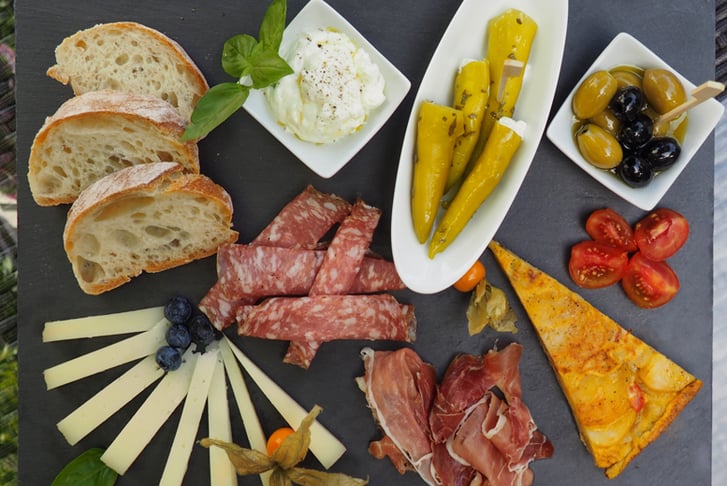 Cheese and Meat or Tapas & Glass of Wine for 2 Four Liars Bistro Stock Image