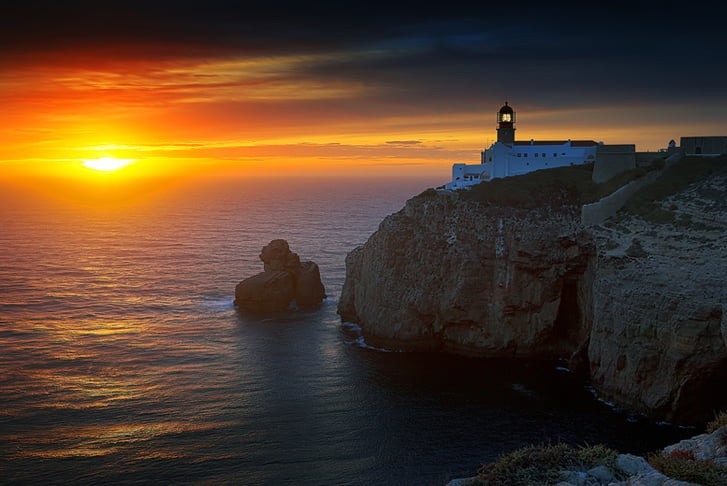 Algarve, Portugal, Stock Image - Sunset Lighthouse