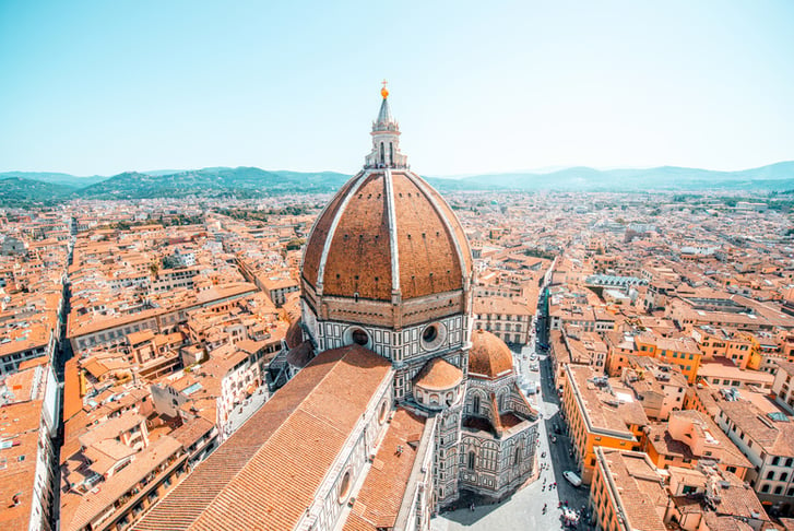 Top cityscape view on the dome of Santa Maria del Fiore church and old town in Florence