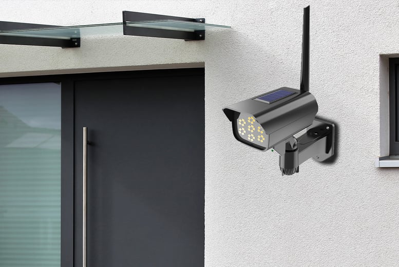 Security cameras with clearance motion sensor lights