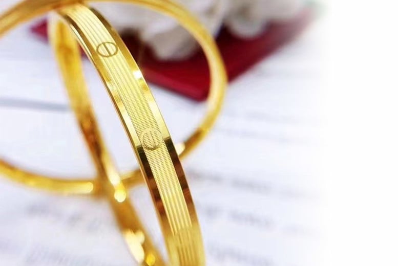 Stainless steel hot sale gold bangle